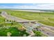 Aerial view featuring highway access and green spaces in a well maintained area at 3852 S Dallas St # 8-102, Aurora, CO 80014