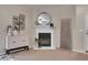 Close up shot of the fireplace in the living room with nice decorations at 3852 S Dallas St # 8-102, Aurora, CO 80014