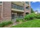 Charming outdoor patio with green fence and inviting scenery at 3852 S Dallas St # 8-102, Aurora, CO 80014