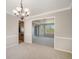 Dining room featuring modern lighting fixtures and a doorway to another room at 102 Staghorn Way, Franktown, CO 80116