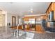 Spacious kitchen with stainless steel appliances, wood cabinets, and granite countertops at 102 Staghorn Way, Franktown, CO 80116