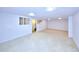 Spacious basement featuring bright recessed lighting, clean white walls, and durable vinyl flooring at 6579 S Lincoln St, Centennial, CO 80121