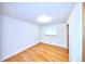 Bright bedroom with hardwood floors, natural light, and neutral walls at 6579 S Lincoln St, Centennial, CO 80121