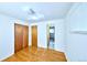 Bright bedroom with hardwood floors, closet space, and fresh paint at 6579 S Lincoln St, Centennial, CO 80121