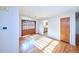 Sun-filled dining area featuring hardwood floors and wood shuttered window at 6579 S Lincoln St, Centennial, CO 80121