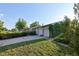 Charming one-story home featuring an attached garage, lovely lawn, and mature landscaping at 6579 S Lincoln St, Centennial, CO 80121