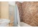 Bathroom with shower/tub combo and window at 6500 E Asbury Ave, Denver, CO 80224