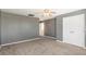 Bedroom with double door closet and ceiling fan at 6500 E Asbury Ave, Denver, CO 80224