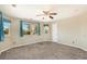 Bright bedroom with ceiling fan and window at 6500 E Asbury Ave, Denver, CO 80224