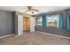 Bedroom with walk-in closet and ceiling fan at 6500 E Asbury Ave, Denver, CO 80224