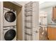 Stackable washer and dryer in laundry closet at 6500 E Asbury Ave, Denver, CO 80224