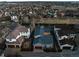 An aerial view of a charming home nestled in a well-manicured suburban neighborhood at 9715 E 33Rd Ave, Denver, CO 80238