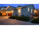 Charming exterior of a home with a beautiful garden and a two-car garage at 9715 E 33Rd Ave, Denver, CO 80238