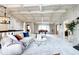 Bright living room features an open layout, coffered ceilings, and elegant decor elements at 561 Saulsbury St, Lakewood, CO 80226