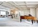 Inviting living room showcasing coffered ceilings, a grand piano, and stylish decor at 561 Saulsbury St, Lakewood, CO 80226