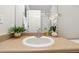 Bathroom featuring a modern sink and vanity with decorative accents, plus a serene ambiance at 12711 Colorado Blvd # H804, Thornton, CO 80241
