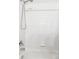 Close-up of a pristine white tiled shower and tub with modern fixtures, offering a spa-like experience at home at 12711 Colorado Blvd # H804, Thornton, CO 80241