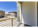 Balcony with view of the parking and other townhome buildings at 20588 E 63Rd Ave, Aurora, CO 80019