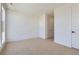 Clean bedroom featuring neutral walls, carpeted floors, and modern recessed lighting at 20588 E 63Rd Ave, Aurora, CO 80019