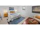 Bedroom featuring a cozy rug, comfortable furniture, and stylish decor at 6684 S Buffalo Dr, Littleton, CO 80120