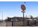 View of Swing Thai Restaurant with large sign, street parking and fenced patio at 751 Eudora St, Denver, CO 80220