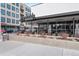 Exterior view of Hopdoddy Burger Bar with outdoor seating and modern architectural design at 751 Eudora St, Denver, CO 80220
