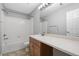 This bathroom features modern finishes, including a shower-tub combo and vanity with counter space at 17148 Waterhouse Cir # A, Parker, CO 80134