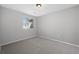 Neutral bedroom with carpet and a bright window at 17148 Waterhouse Cir # A, Parker, CO 80134