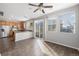 Modern kitchen featuring stainless steel appliances, wooden cabinets, and plenty of natural light from adjacent windows at 17148 Waterhouse Cir # A, Parker, CO 80134