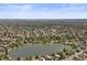 Expansive aerial view showing the community's proximity to lakes and the city skyline at 2704 S Ames Way, Denver, CO 80227