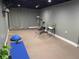 Finished basement gym with workout equipment, neutral walls and carpet at 5101 Meade St, Denver, CO 80221
