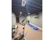 Finished basement gym with workout equipment and neutral decor at 5101 Meade St, Denver, CO 80221