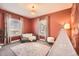 Stylish bedroom with a unique teepee accent, natural light, and cozy furnishings at 5101 Meade St, Denver, CO 80221