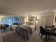 Comfortable bedroom with a cozy bed, soft seating, and a dedicated workspace at 5101 Meade St, Denver, CO 80221