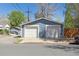 Two-car detached garage, showcasing curb appeal at 5101 Meade St, Denver, CO 80221