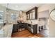Stylish kitchen featuring stainless steel appliances, granite countertops, and ample cabinet space at 5101 Meade St, Denver, CO 80221