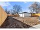 Spacious backyard features wood fence, a detached garage and a lot of sunlight at 1073 Galena St, Aurora, CO 80010