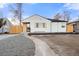 Charming home featuring a quaint walkway and modern updates to the exterior at 1073 Galena St, Aurora, CO 80010