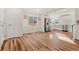 Open concept with hard wood floors connecting the living room and kitchen at 1073 Galena St, Aurora, CO 80010