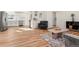 Inviting living room featuring hard wood floors that flow through the house at 1073 Galena St, Aurora, CO 80010