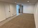 Finished basement area featuring neutral carpet, recessed lighting and multiple access points at 5535 Clear Creek Dr, Denver, CO 80212