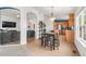Open-concept dining area seamlessly connected to the kitchen and living room spaces at 1510 S De Gaulle Cir, Aurora, CO 80018