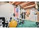 Basement gym with weightlifting equipment and exercise area for fitness enthusiasts at 2208 Champlain Dr, Boulder, CO 80301