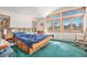 Main bedroom with many windows for natural light at 2208 Champlain Dr, Boulder, CO 80301