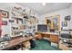 Office space with built-in shelves, dual desks, and bright window at 2208 Champlain Dr, Boulder, CO 80301