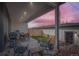 Backyard patio featuring a grill, dining area, and beautiful sunset views at 3261 S Sherman St, Englewood, CO 80113