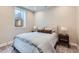 Serene bedroom featuring a comfortable bed, soft lighting, and neutral color palette for a relaxing space at 3261 S Sherman St, Englewood, CO 80113