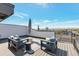 Outdoor rooftop deck with seating, views and stylish decor at 3261 S Sherman St, Englewood, CO 80113