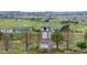 Stone Creek Ranch entrance sign, surrounded by lush greenery and picturesque views at 6185 Saddle Bow Ave, Parker, CO 80134