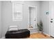 Welcoming entryway with a storage bench, mirror, and hardwood floors at 6185 Saddle Bow Ave, Parker, CO 80134